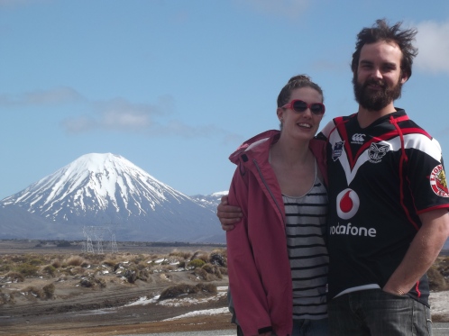 Ruth and Robin next to a snow-covered Mount Ruapehu (Mount Doom)